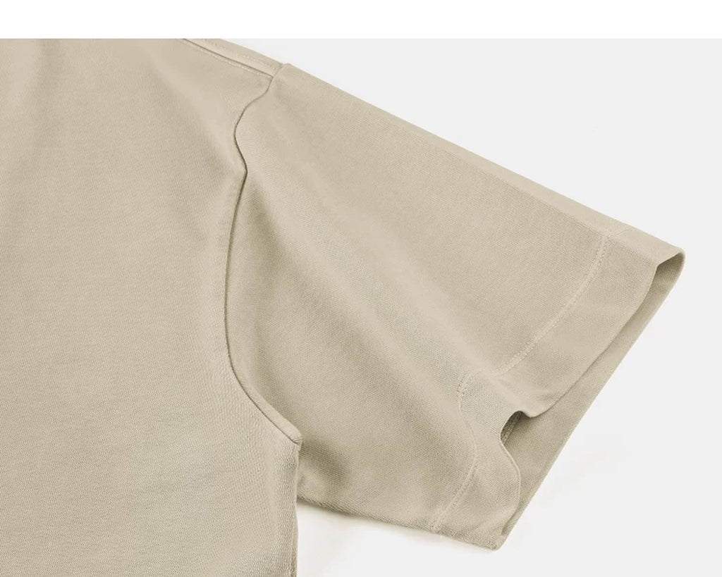 IDLT washed T-shirt, beige sleeve.