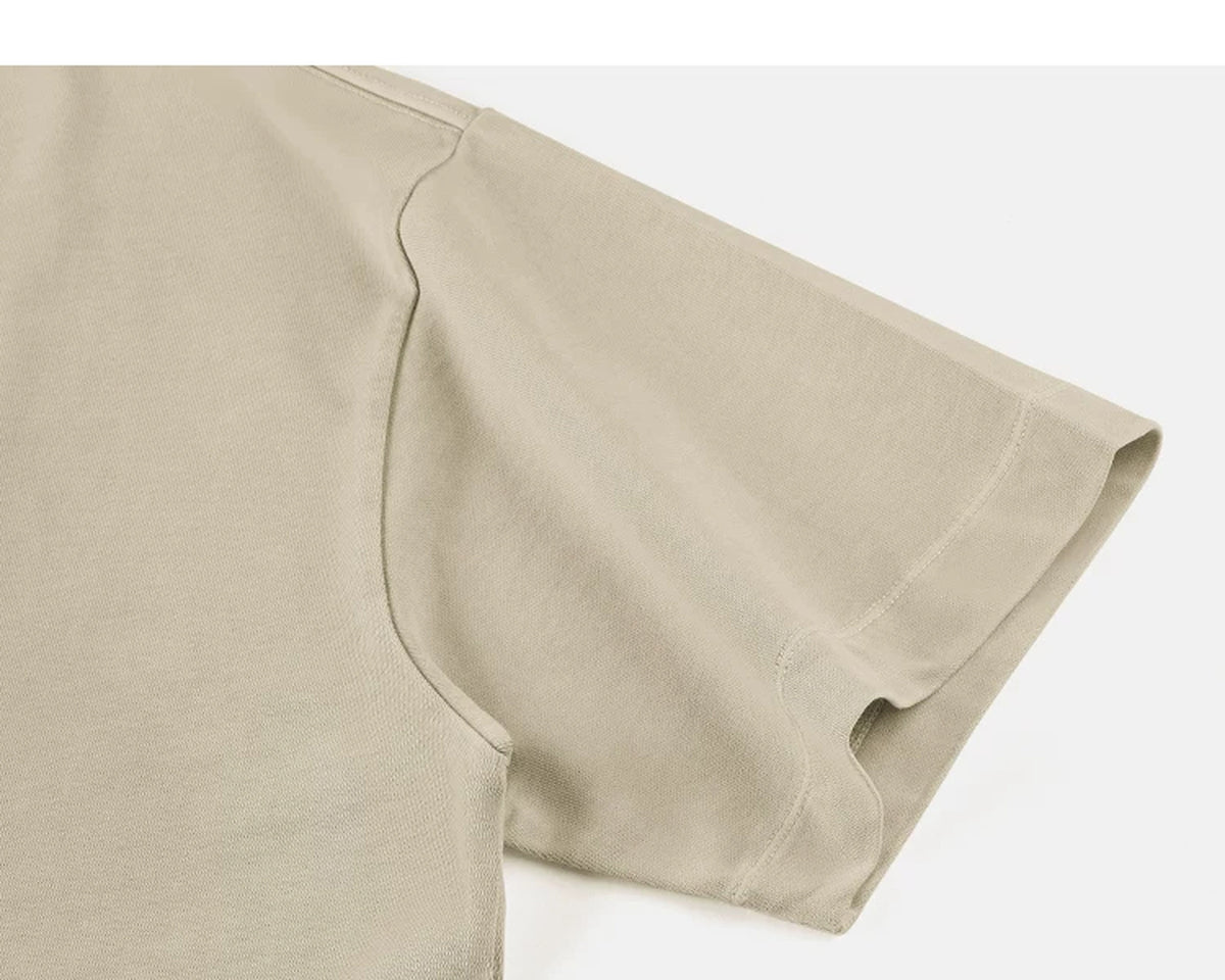 IDLT washed T-shirt, beige sleeve.