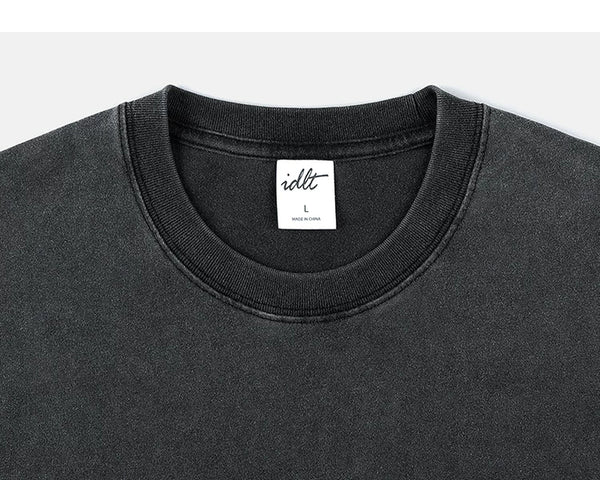 IDLT washed T-shirt, black crewneck.
