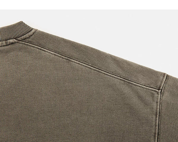 IDLT washed sweatshirt, olive shoulder seam.