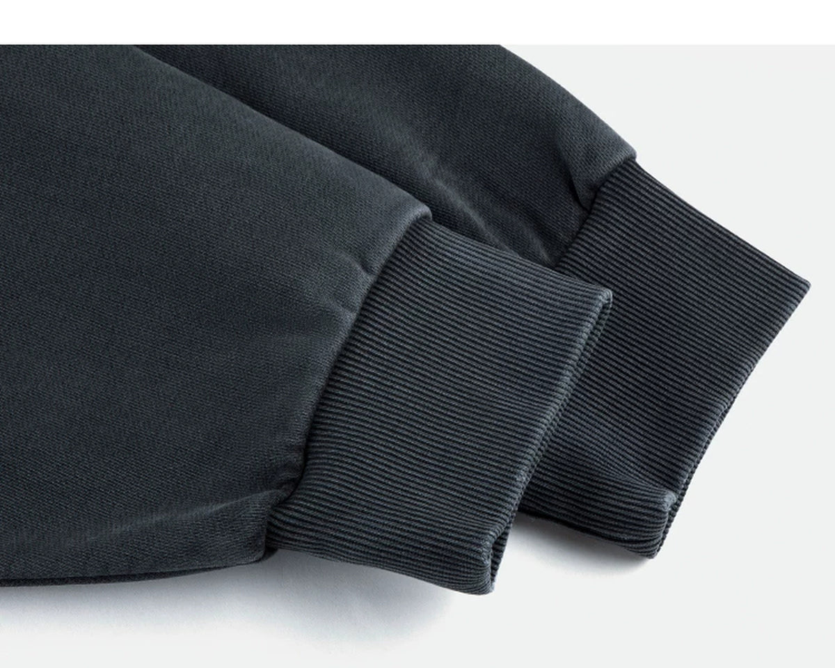 IDLT washed sweatshirt, dark gray ribbed cuffs.