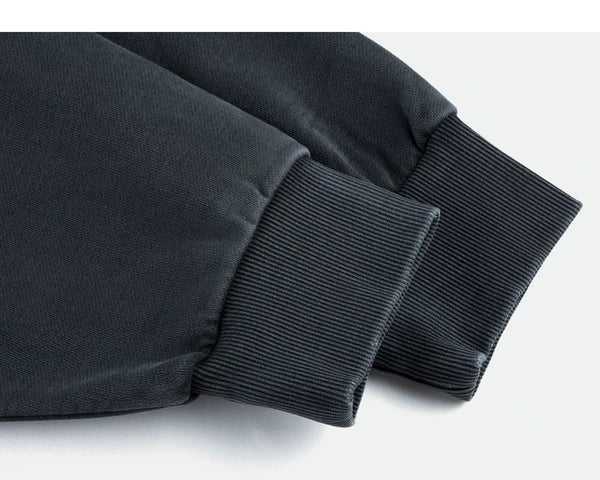 IDLT washed sweatshirt, dark gray ribbed cuffs.