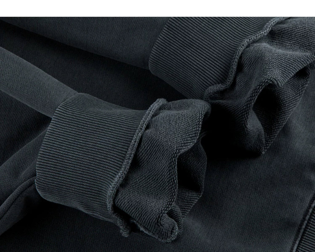 IDLT washed sweatshirt, dark gray turned cuffs.