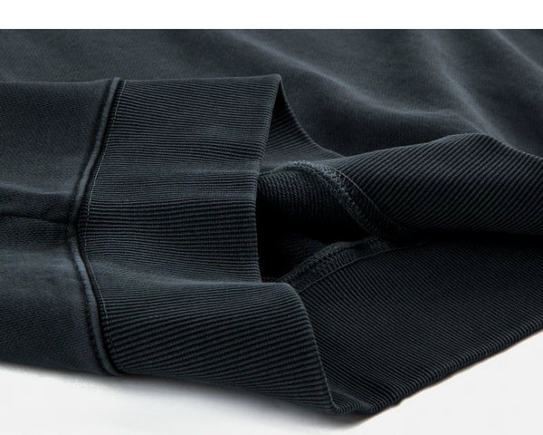 IDLT washed sweatshirt, dark gray folded hem.