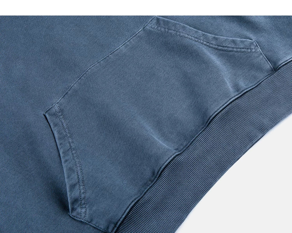IDLT washed hoodie, blue kangaroo pocket.