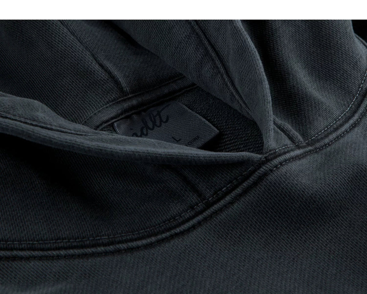 IDLT washed hoodie, dark gray neckline label.