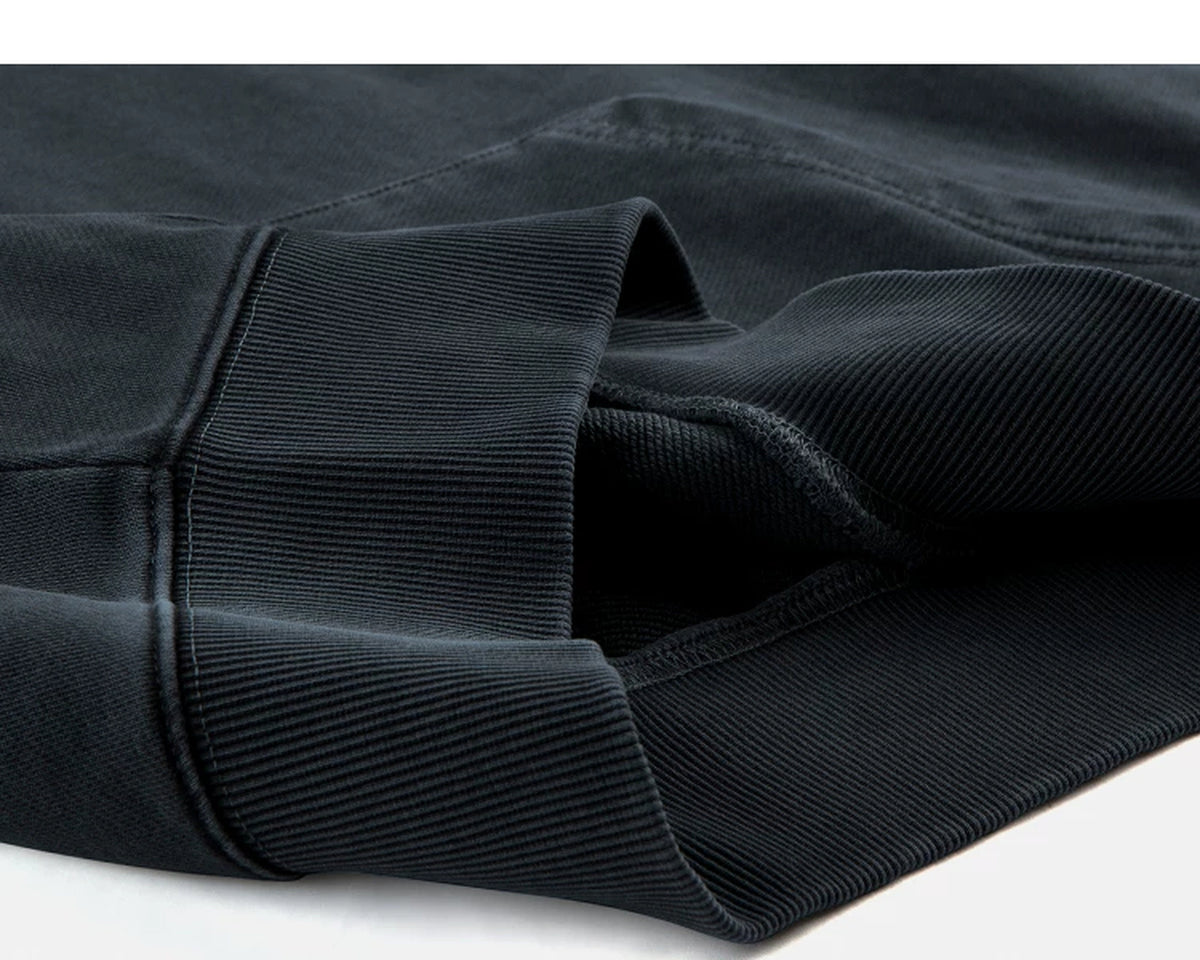 IDLT washed hoodie, dark gray folded hem.
