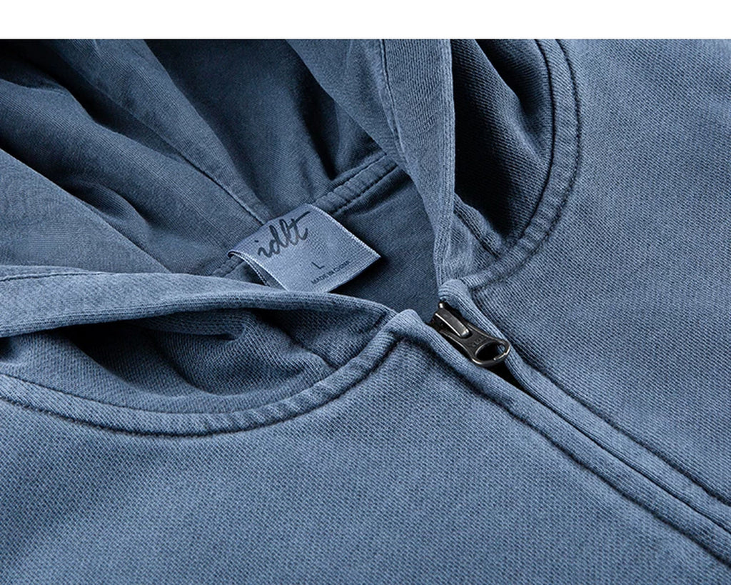 IDLT washed zip hoodie, blue neckline and zipper.