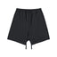 IDLT sweat shorts, black front.