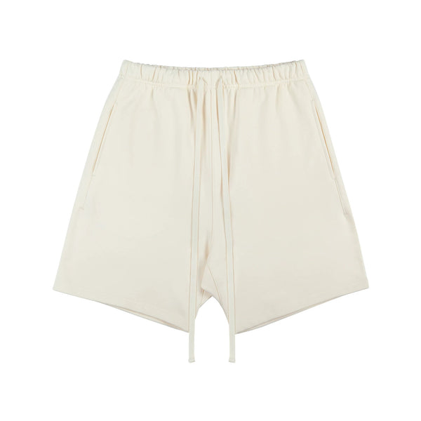 IDLT sweat shorts, cream front.