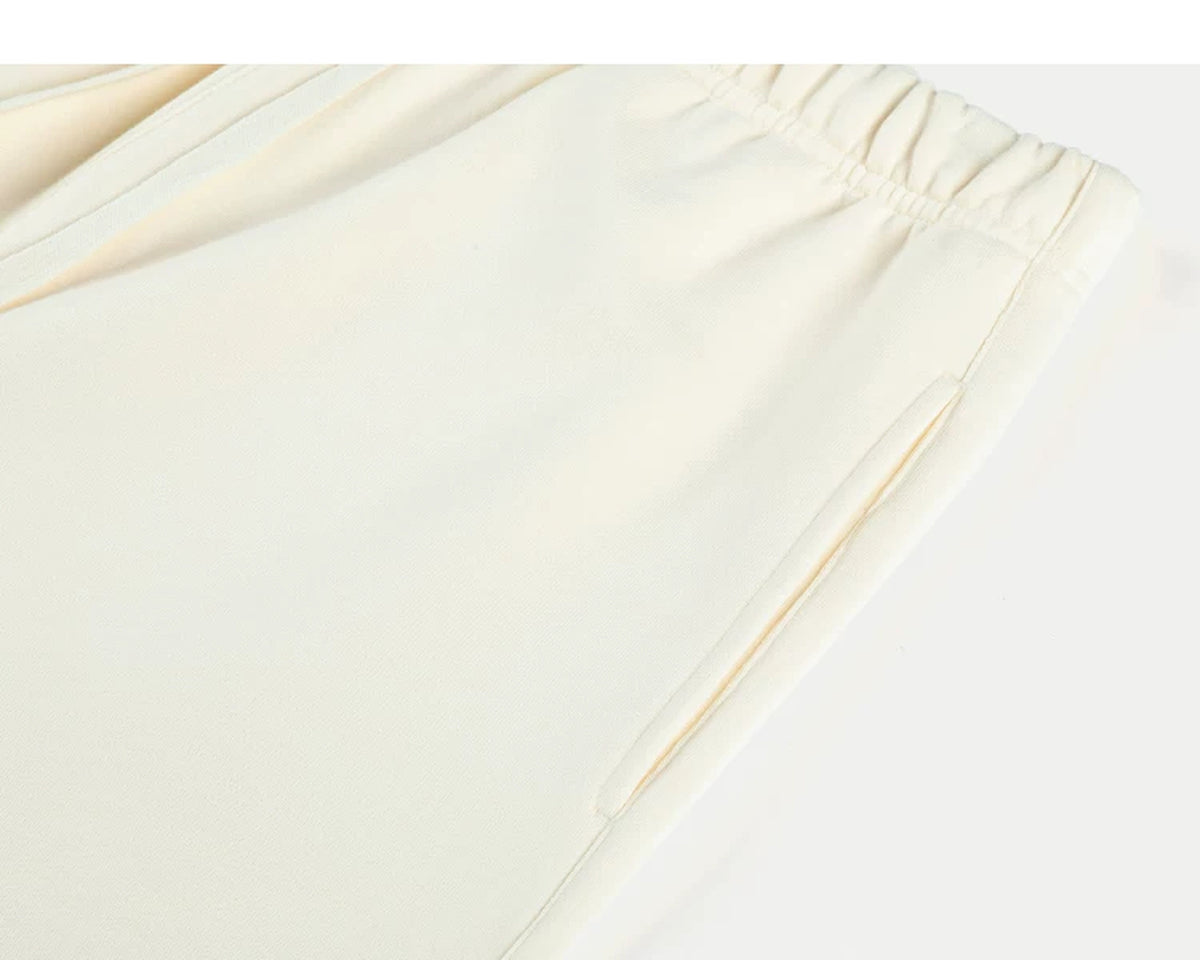 IDLT sweat shorts, cream side pocket.