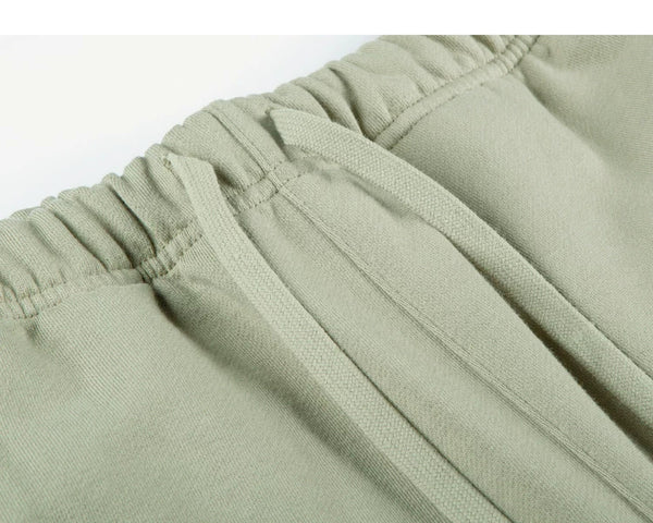 IDLT sweat shorts, sage green waist drawstring.