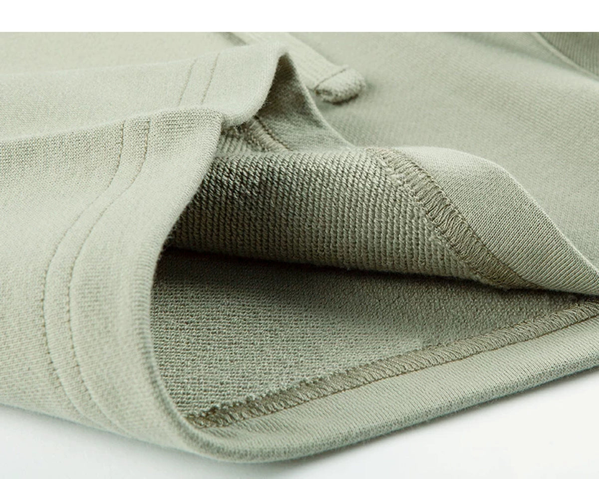 IDLT sweat shorts, sage green folded hem.