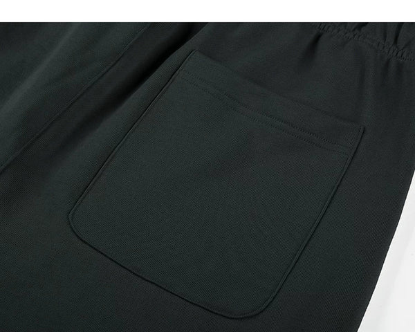 IDLT sweat shorts, black back pocket.