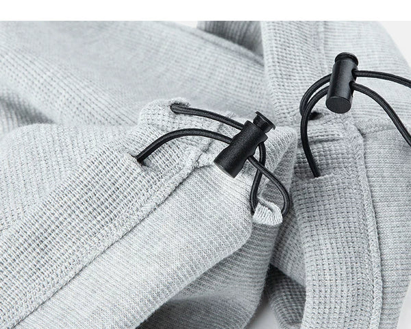 IDLT waffle sweatpants, heather gray ankle drawcords.