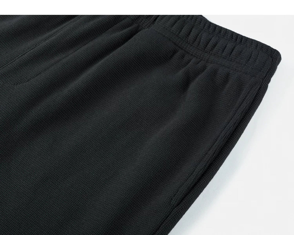 IDLT waffle sweatpants, black side pocket.
