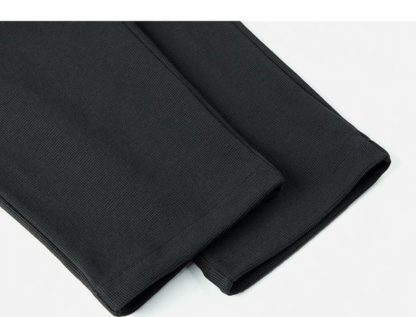 IDLT waffle sweatpants, black leg hems.