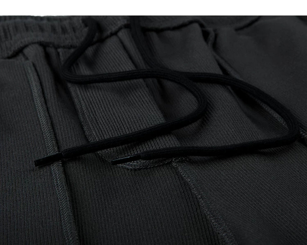 IDLT waffle sweatpants, black inner drawstring.