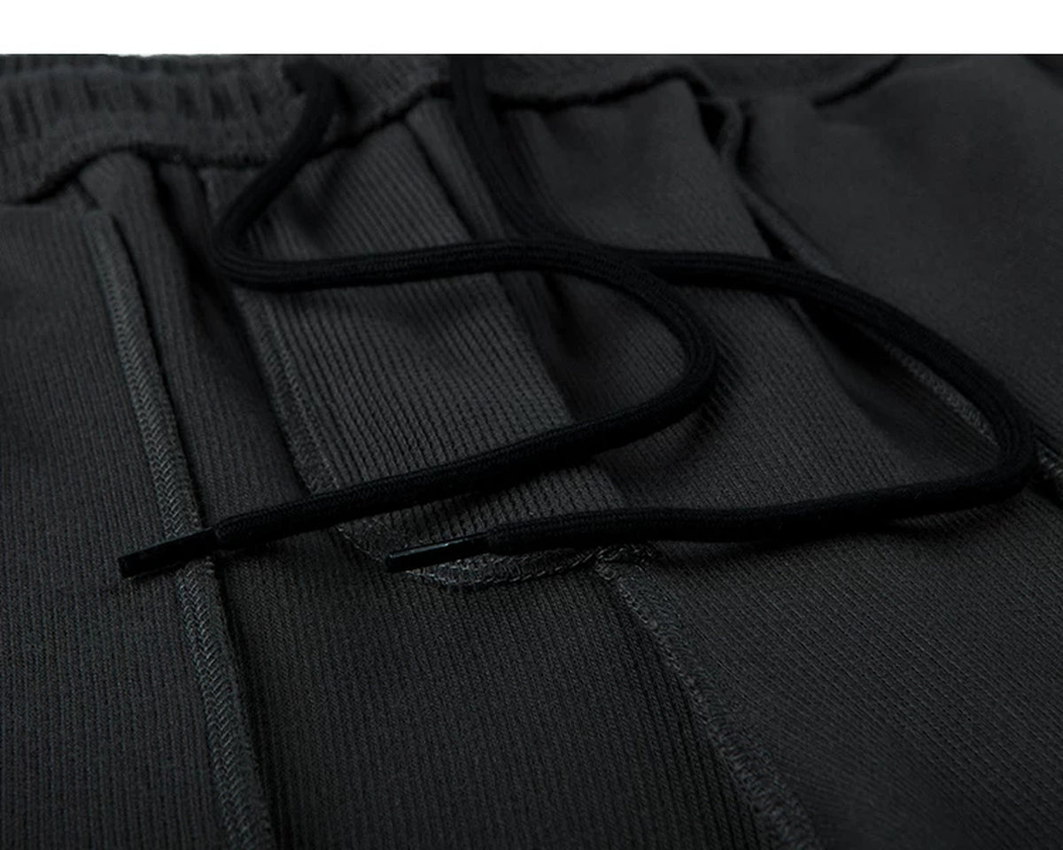 IDLT waffle sweatpants, black inner drawstring.