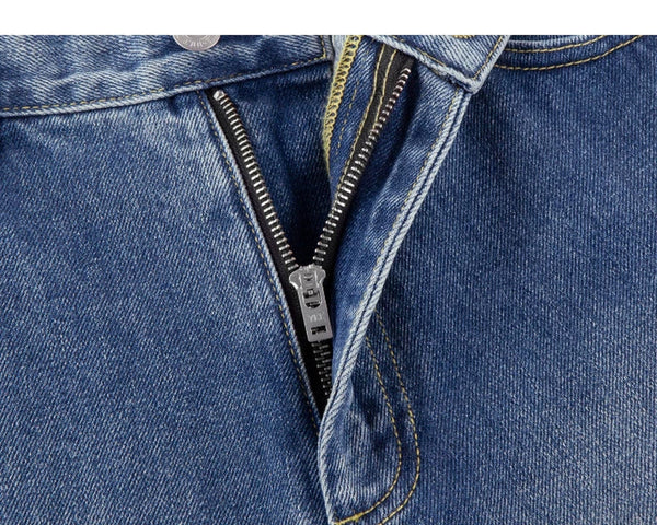 Washed Curved-Leg Jeans - COPPING THREADS - IDLT