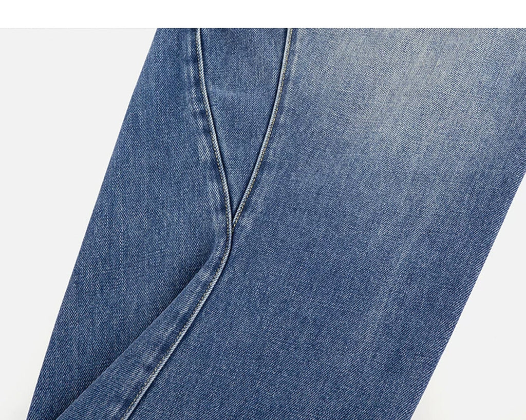 Washed Curved-Leg Jeans - COPPING THREADS - IDLT