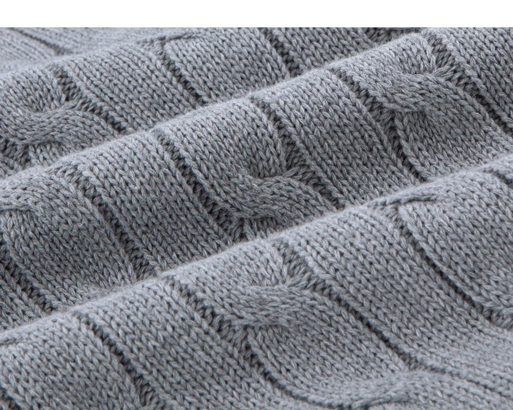 IDLT cable knit zip sweater, gray cable knit fabric folds.