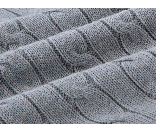 IDLT cable knit zip sweater, gray cable knit fabric folds.
