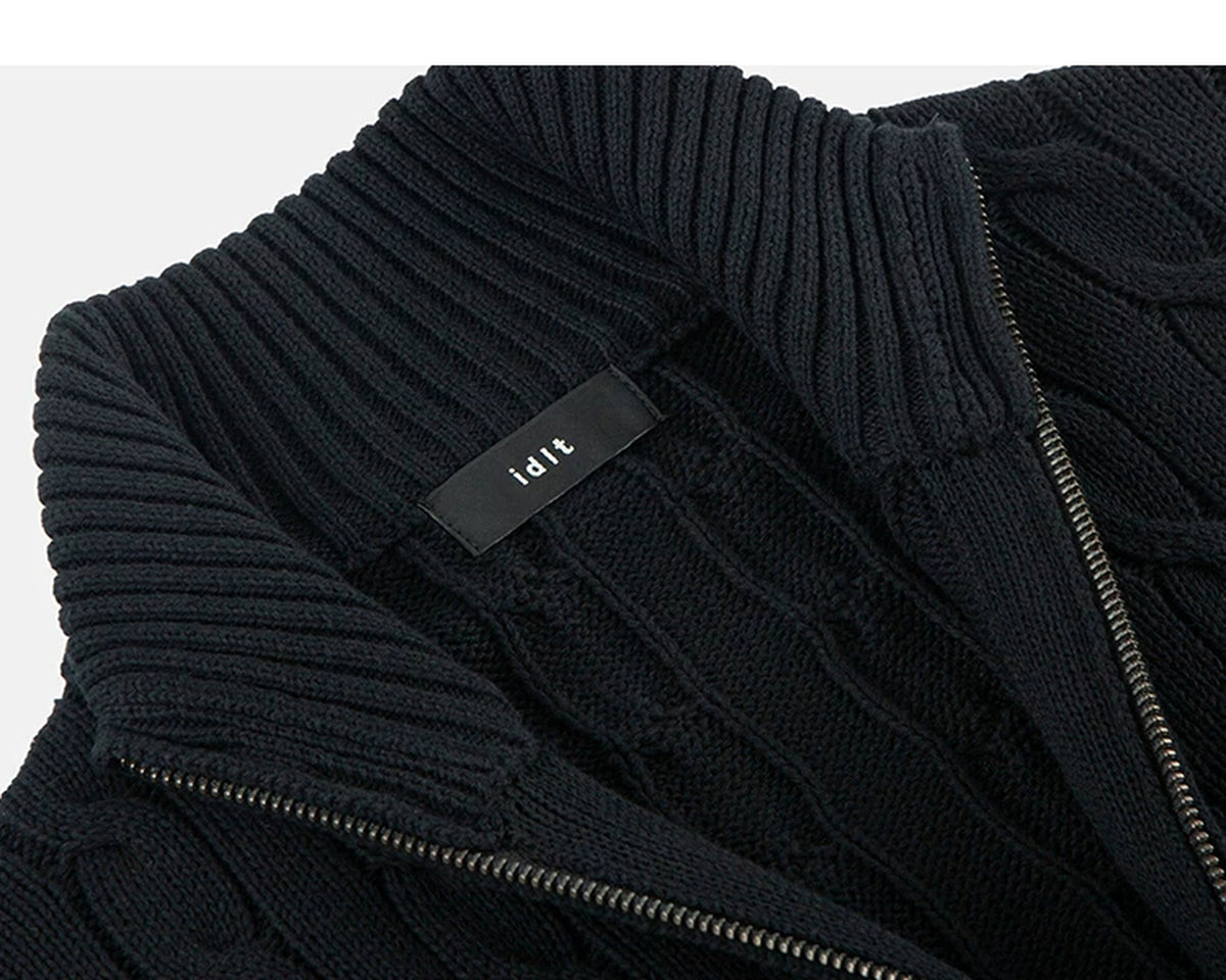 IDLT cable knit zip sweater, black neckline label.