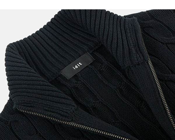 IDLT cable knit zip sweater, black neckline label.