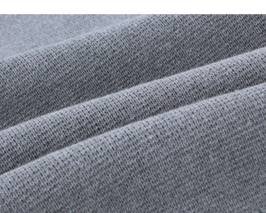 IDLT cardigan, gray knit fabric folds.