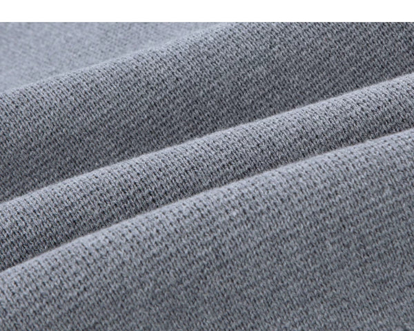 IDLT cardigan, gray knit fabric folds.