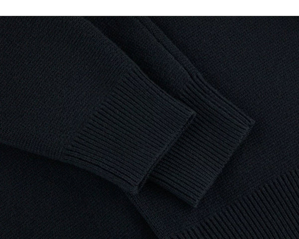 IDLT cardigan, black ribbed cuffs.