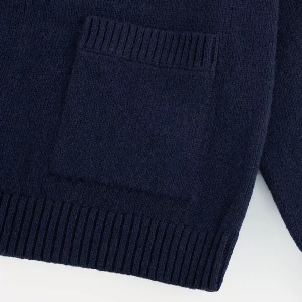 IDLT stand collar cardigan, navy patch pocket close-up.