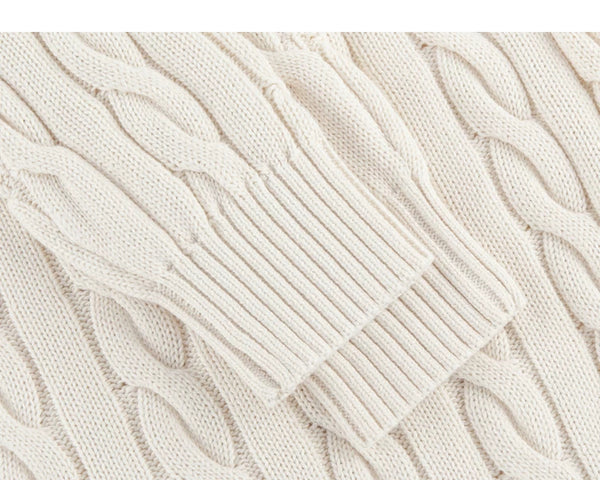 IDLT cable knit half zip sweater, cream ribbed cuffs.
