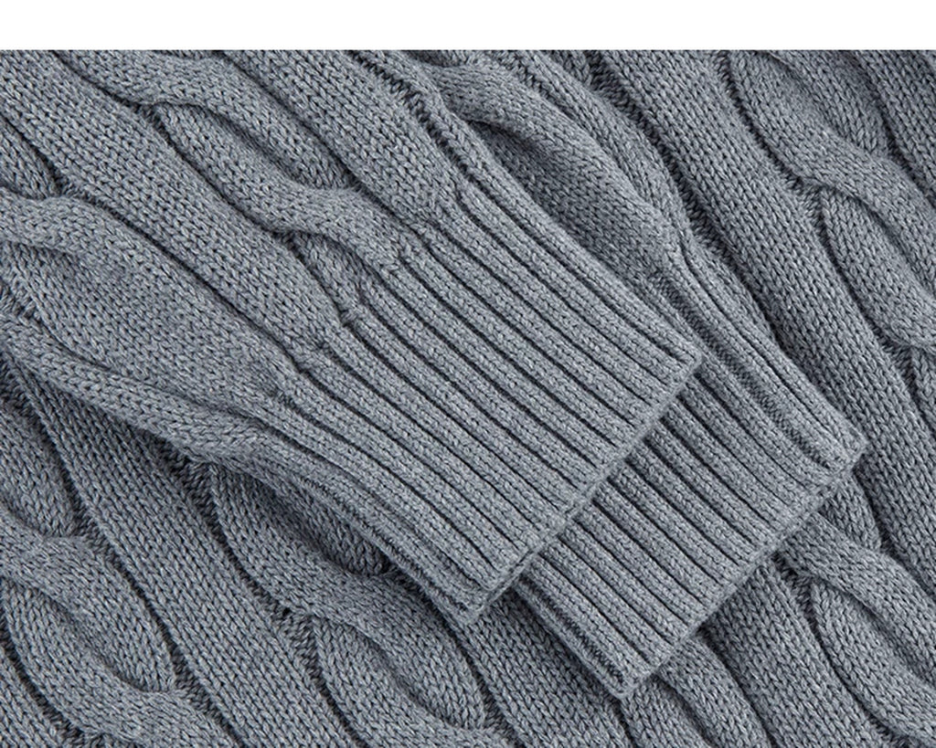 IDLT cable knit half zip sweater, gray ribbed cuffs.