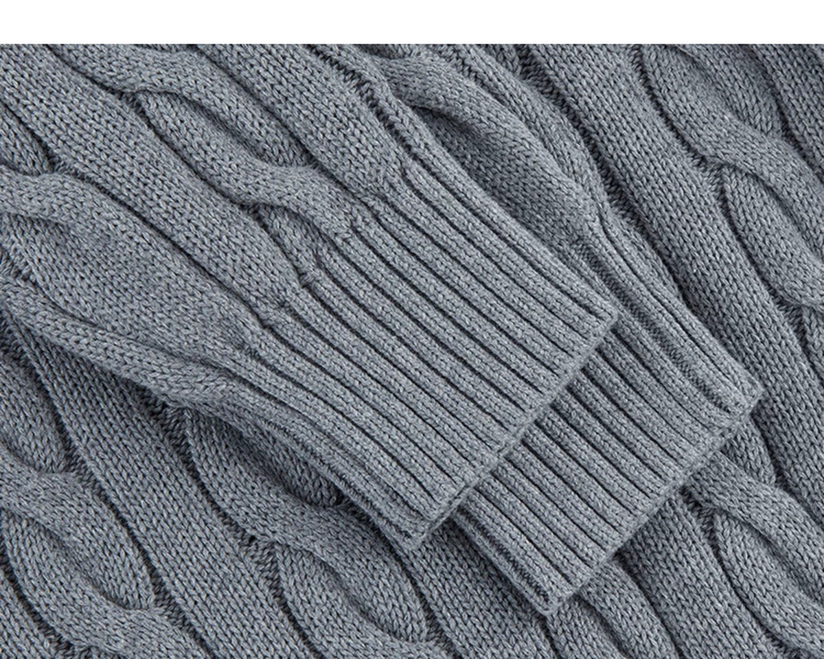 IDLT cable knit half zip sweater, gray ribbed cuffs.