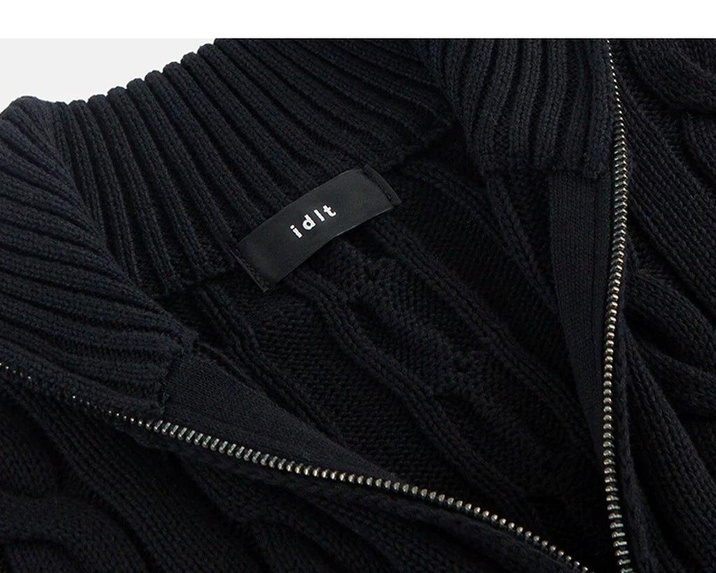 IDLT cable knit half zip sweater, black neckline label.