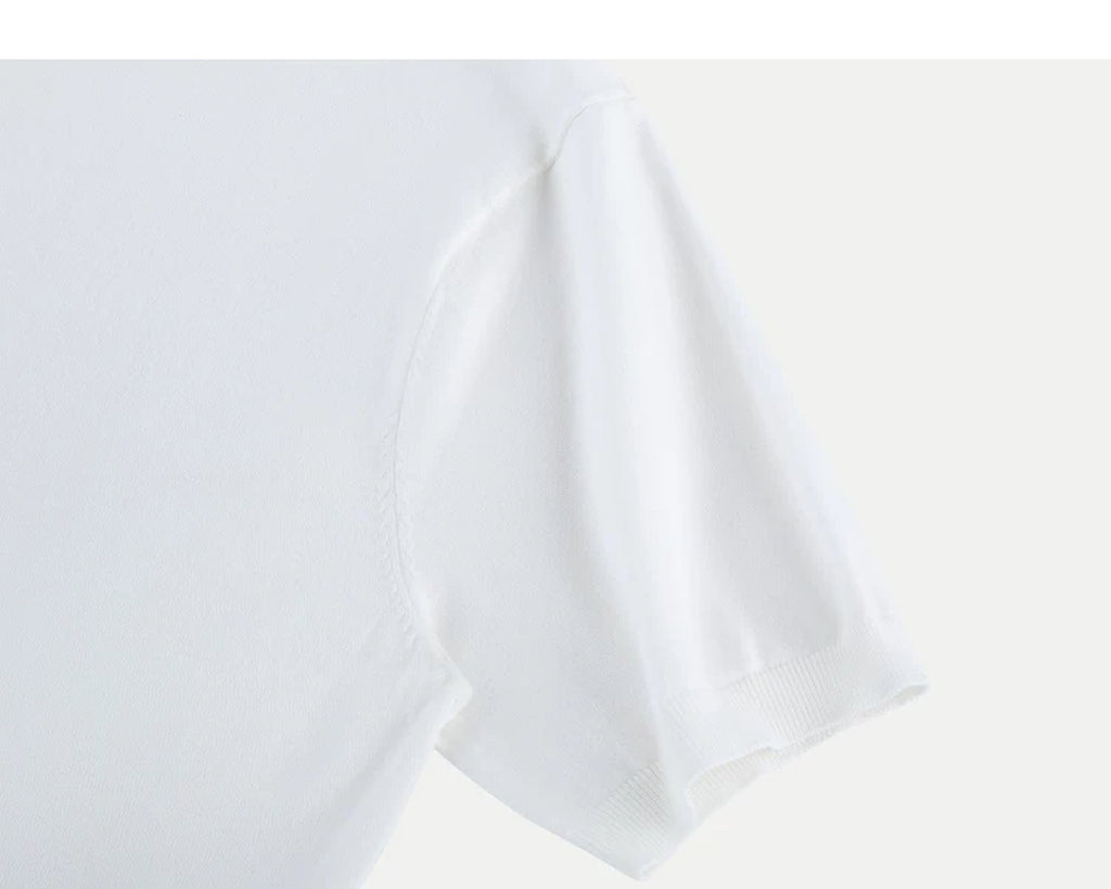 IDLT knit polo shirt, white sleeve.