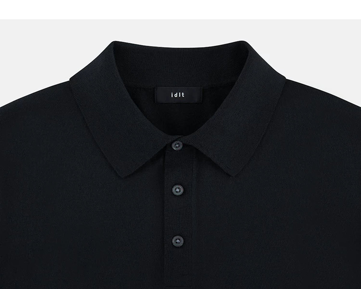IDLT knit polo shirt, black collar and placket.