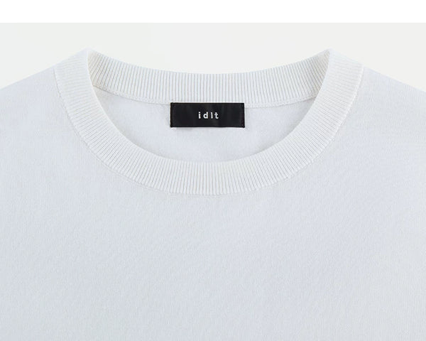 IDLT short sleeve knit top, white crewneck.
