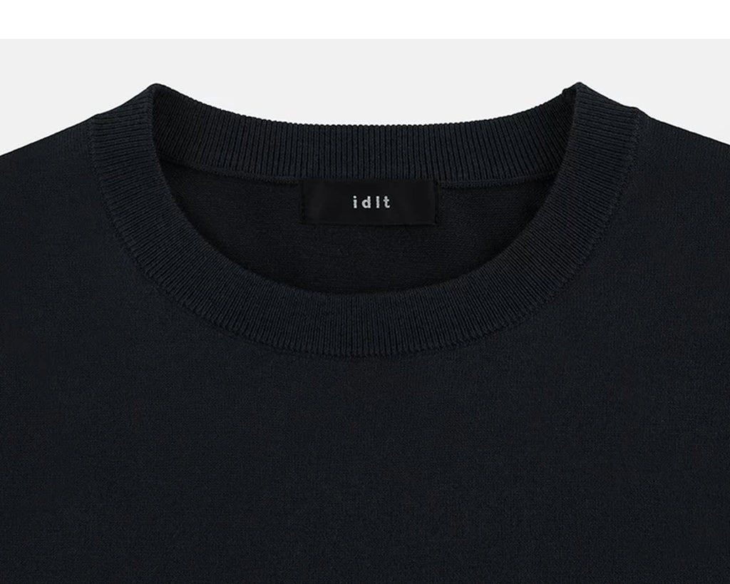 IDLT short sleeve knit top, black crewneck.