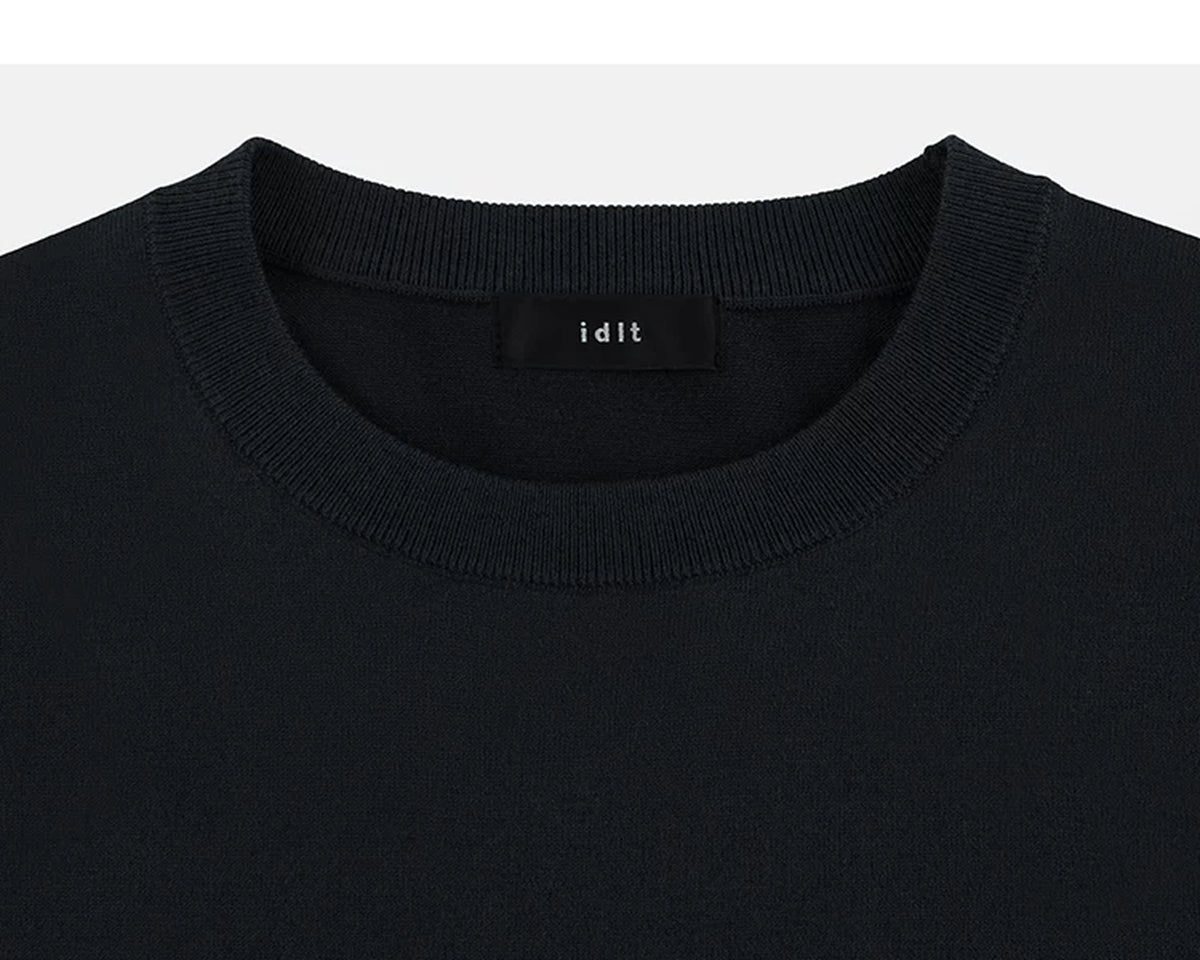IDLT short sleeve knit top, black crewneck.