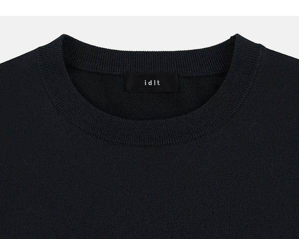 IDLT short sleeve knit top, black crewneck.