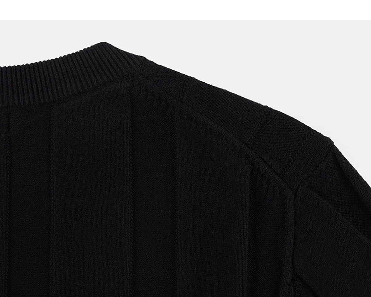 IDLT ribbed short sleeve sweater, black back shoulder seam.