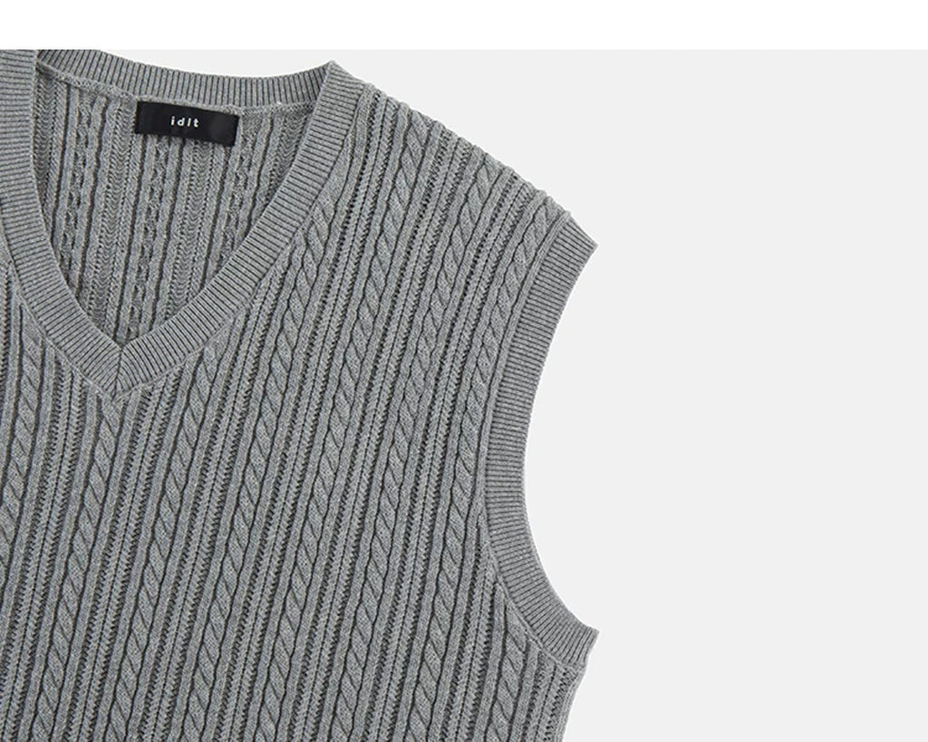 IDLT cable knit vest, gray angled armhole.