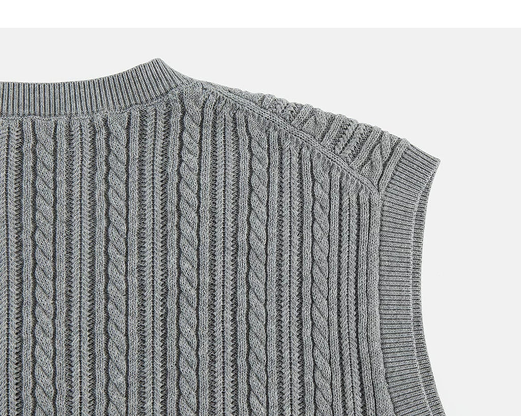 IDLT cable knit vest, gray back shoulder.