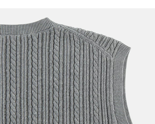 IDLT cable knit vest, gray back shoulder.