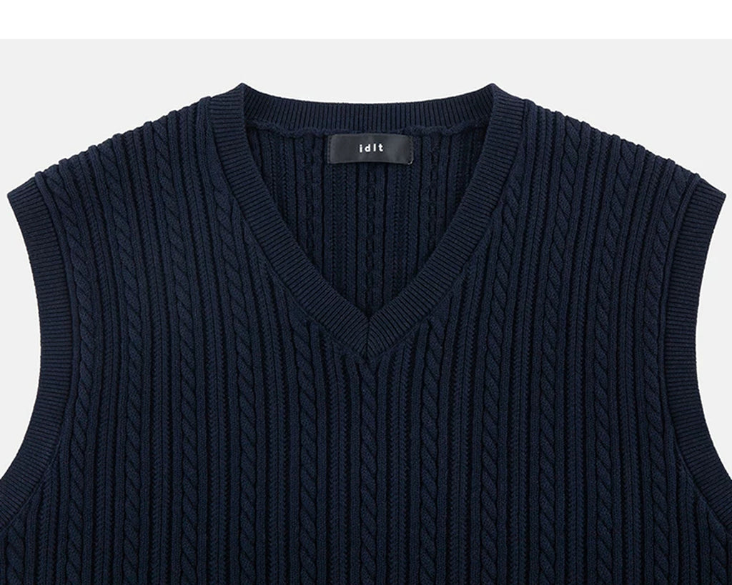 IDLT cable knit vest, navy V-neck.