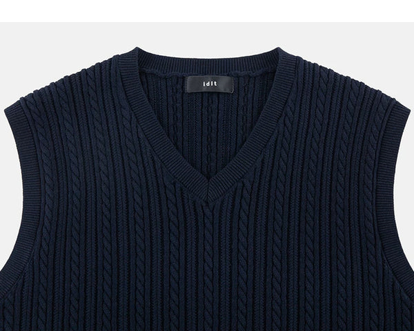 IDLT cable knit vest, navy V-neck.