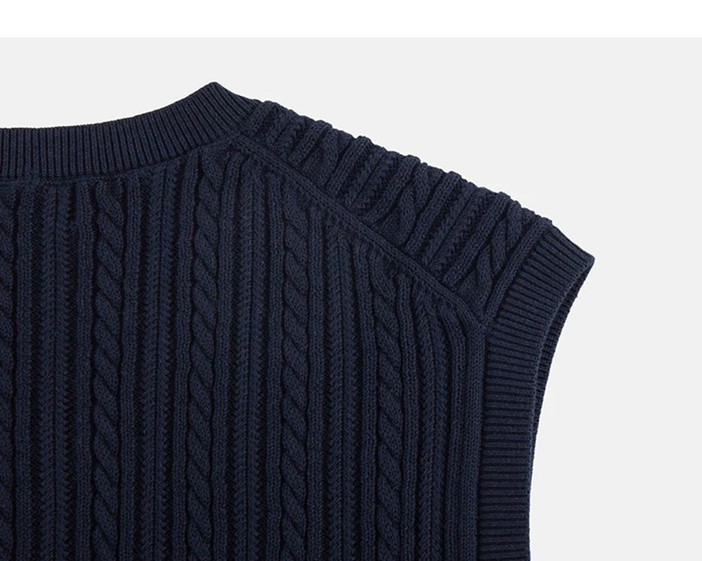IDLT cable knit vest, navy back shoulder.